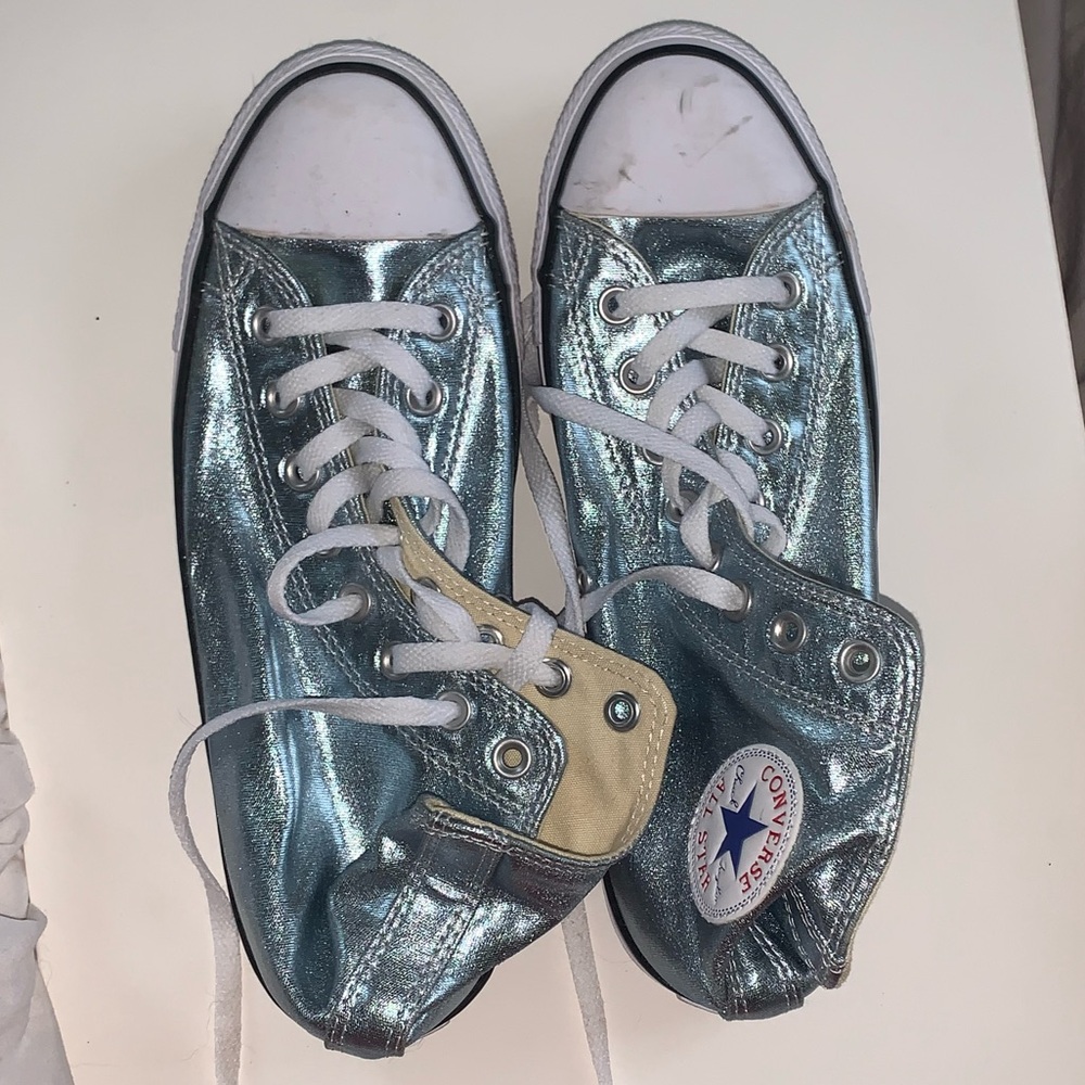 Metallic blue high-top Converse